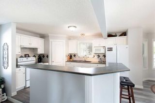 Photo 12: 40 Canoe Road SW: Airdrie Detached for sale : MLS®# A2067134