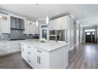 Photo 18: 4458 FARINA Road in Abbotsford: Abbotsford East House for sale in "Farina Heights" : MLS®# R2696257