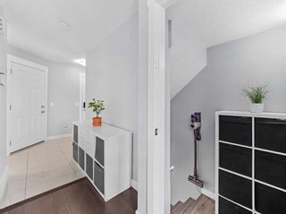 Photo 8: 7 West Coach Manor SW in Calgary: West Springs Row/Townhouse for sale : MLS®# A2129977