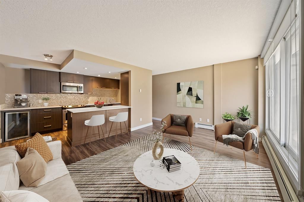 Main Photo: 105 916 Memorial Drive NW in Calgary: Sunnyside Apartment for sale : MLS®# A2036227