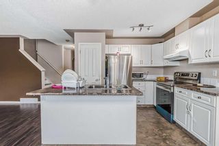 Photo 11: 146 Rocky Vista Circle NW in Calgary: Rocky Ridge Row/Townhouse for sale : MLS®# A2072881