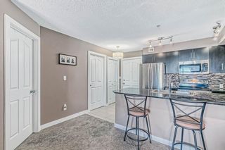 Photo 6: 2401 403 Mackenzie Way SW: Airdrie Apartment for sale : MLS®# A2024929