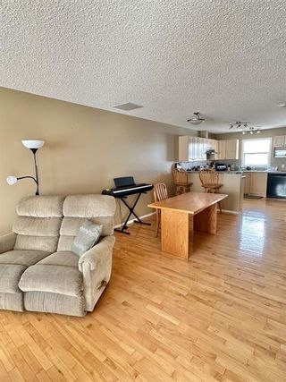 Photo 3: 305 Prairie Sound Circle NW: High River Row/Townhouse for sale : MLS®# A2130103