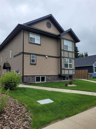 Photo 1: C 3618 51 Ave: Red Deer Row/Townhouse for sale : MLS®# A1234734