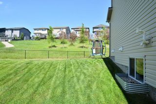 Photo 30: 255 SUNSET Point: Cochrane Row/Townhouse for sale : MLS®# C4224587