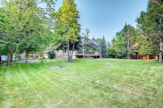 Photo 4: 9041 9 Avenue SW in Calgary: West Springs Detached for sale : MLS®# A1243548