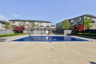 Photo 32: 129 7938 209 Street in Langley: Willoughby Heights Townhouse for sale in "Red Maple Park" : MLS®# R2644847