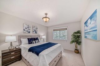 Photo 16: 59 Sandarac Circle NW in Calgary: Sandstone Valley Row/Townhouse for sale : MLS®# A2116581