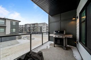 Photo 9: 34 Cranbrook Gardens SE in Calgary: Cranston Row/Townhouse for sale : MLS®# A2103164