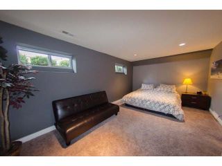 Photo 12: 1001 WINDWARD Drive in Coquitlam: Ranch Park House for sale in "Ranch Park" : MLS®# R2248714