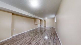 Photo 2: 3815 51 Street in Edmonton: Zone 29 House for sale : MLS®# E4342194