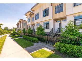 Photo 1: 101 9989 E BARNSTON Drive in Surrey: Fraser Heights Townhouse for sale in "Highcrest at Fraser Heights" (North Surrey)  : MLS®# R2371201