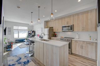 Photo 1: 304 71 Shawnee Common SW in Calgary: Shawnee Slopes Apartment for sale : MLS®# A2027127