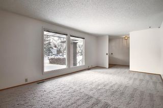 Photo 4: 762 Woodpark Road SW in Calgary: Woodlands Detached for sale : MLS®# A1048869