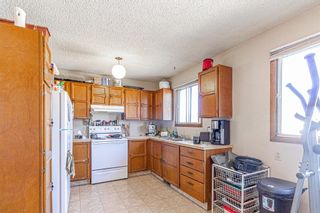 Photo 7: 2403 43 Street SE in Calgary: Forest Lawn Duplex for sale : MLS®# A1082669