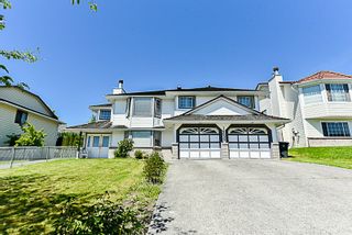 Photo 1: 14859 SPENSER Drive in Surrey: Bear Creek Green Timbers House for sale : MLS®# R2168975
