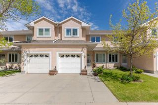 Main Photo: 64 388 Sandarac Drive NW in Calgary: Sandstone Valley Row/Townhouse for sale : MLS®# A2137580