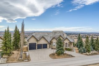 Photo 1: 11 Slopes Grove SW in Calgary: Springbank Hill Detached for sale : MLS®# A1197470