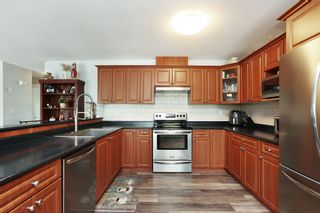 Photo 12: 203 16718 60 Avenue in Surrey: Cloverdale BC Condo for sale in "MCLELLAN MEWS" (Cloverdale)  : MLS®# R2706895