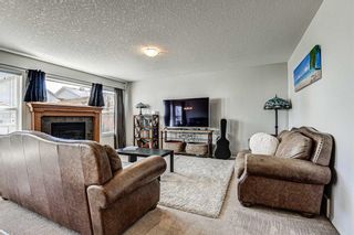 Photo 5: 28 Cougarstone Square SW in Calgary: Cougar Ridge Detached for sale : MLS®# A1099416