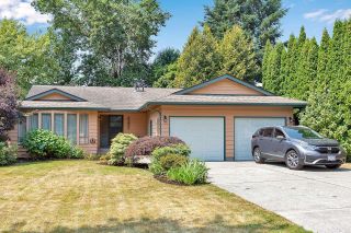 Photo 1: 6235 171 Street in Surrey: Cloverdale BC House for sale in "WEST CLOVERDALE" (Cloverdale)  : MLS®# R2598284