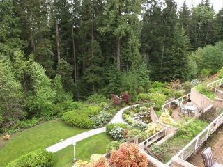 Photo 2: 106 1500 OSTLER Court in North Vancouver: Indian River Condo for sale in "MOUNTAIN TERRACE" : MLS®# V1002768