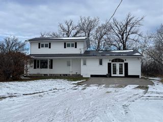 Photo 1: 99145 10E Road in Komarno: House for sale : MLS®# 202329730