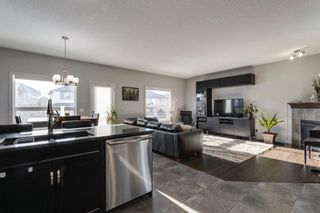 Photo 7: 106 Everhollow Green SW in Calgary: Evergreen Detached for sale : MLS®# A2013156
