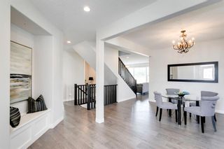 Photo 4: 25 Tremblant Terrace SW in Calgary: Springbank Hill Detached for sale : MLS®# A1240096
