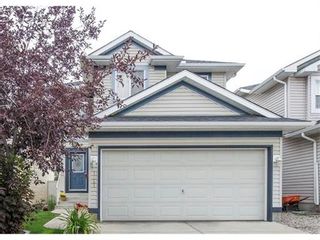 Photo 1: 1041 BRIDLEMEADOWS Manor SW in Calgary: Bridlewood Residential for sale ()  : MLS®# C4027220