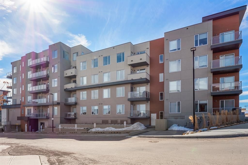 Main Photo: 409 71 Shawnee Common SW in Calgary: Shawnee Slopes Apartment for sale : MLS®# A2052005