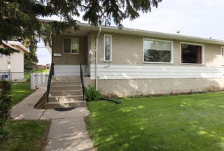 Photo 2: 1427 & 1429 Rosehill Drive NW in Calgary: Rosemont Full Duplex for sale : MLS®# A1253117