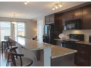 Photo 2: 418 WALDEN Drive SE in Calgary: Walden House for sale : MLS®# C3649474