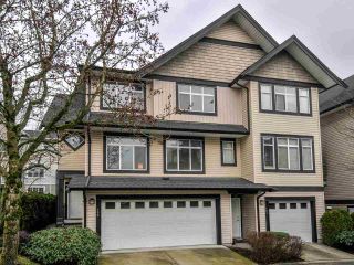 Photo 1: 102 19932 70 Avenue in Langley: Willoughby Heights Townhouse for sale in "SUMMERWOOD" : MLS®# R2335407