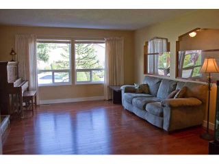 Photo 2: 1602 HEMLOCK Place in Port Moody: Mountain Meadows House for sale : MLS®# V927429