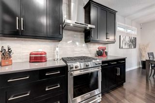 Photo 11: 255 Tremblant Way SW in Calgary: Springbank Hill Detached for sale : MLS®# A2140703