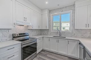 Photo 12: 56 Rowley Terrace NW in Calgary: C-483 Detached for sale : MLS®# A2024659