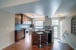 Photo 11: 24 Aspen Hills Common SW in Calgary: Aspen Woods Row/Townhouse for sale : MLS®# A1209007