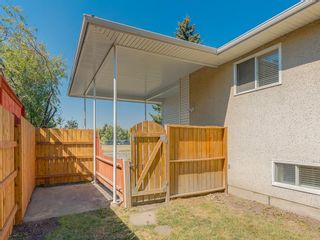 Photo 5: 11036 BRATON Place SW in Calgary: Braeside House for sale : MLS®# C4136035