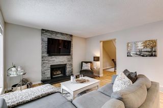 Photo 12: 128 Woodridge Drive SW in Calgary: Woodlands Detached for sale : MLS®# A2014990