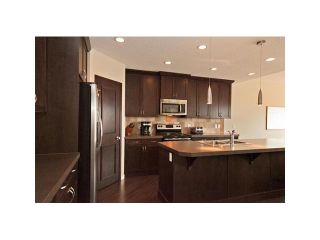 Photo 2: 86 BRIGHTONCREST Grove SE in CALGARY: New Brighton Residential Attached for sale (Calgary)  : MLS®# C3561715