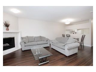 Photo 1: 113 8651 ACKROYD Road in Richmond: Brighouse Condo for sale in "CARTIER" : MLS®# V925065