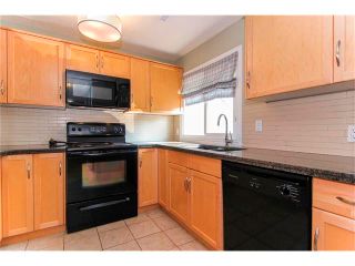 Photo 8: 267 78 Glamis Green SW in Calgary: Glamorgan House for sale : MLS®# C4024998