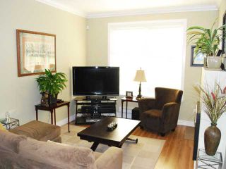 Photo 4: 202 4823 MAIN Street in Vancouver: Main Condo for sale in "THE RAI BUILDING" (Vancouver East)  : MLS®# V845352