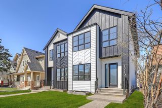 Main Photo: 1714 6 Avenue NW in Calgary: Hillhurst Semi Detached (Half Duplex) for sale : MLS®# A2053797