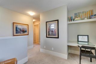Photo 16: 73 Cougartown Circle SW in Calgary: Cougar Ridge Detached for sale : MLS®# A1179020