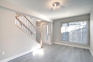 Photo 2: 118 36 Glamis Green SW in Calgary: Glamorgan Row/Townhouse for sale : MLS®# A2012948
