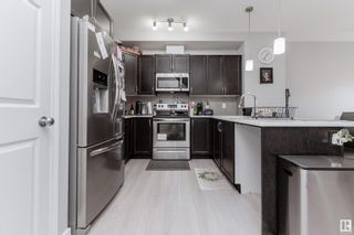 Photo 5: 412 CRYSTALLINA NERA Drive in Edmonton: Zone 28 House Half Duplex for sale : MLS®# E4342430