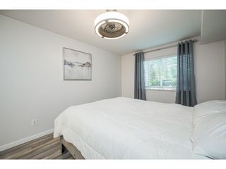 Photo 16: 102 5759 GLOVER Road in Langley: Langley City Condo for sale in "College Court" : MLS®# R2712659