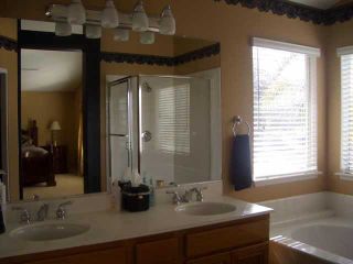 Photo 3: RANCHO PENASQUITOS Residential for sale : 4 bedrooms : 7405 Park Village Rd in San Diego